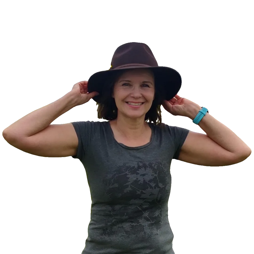 Rosemary Gin, reading and dyslexia specialist, smiling outdoors in a wide-brimmed hat